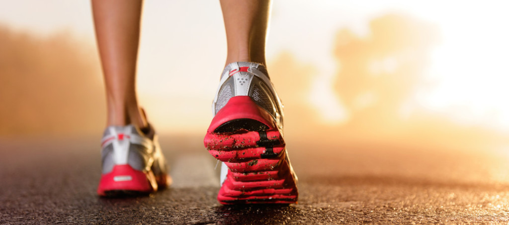 bigstock-Runner-feet-running-on-road-cl-33686270-1